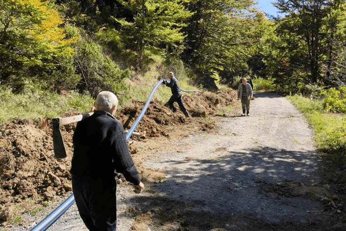 Donation of water hose to Tiodze village